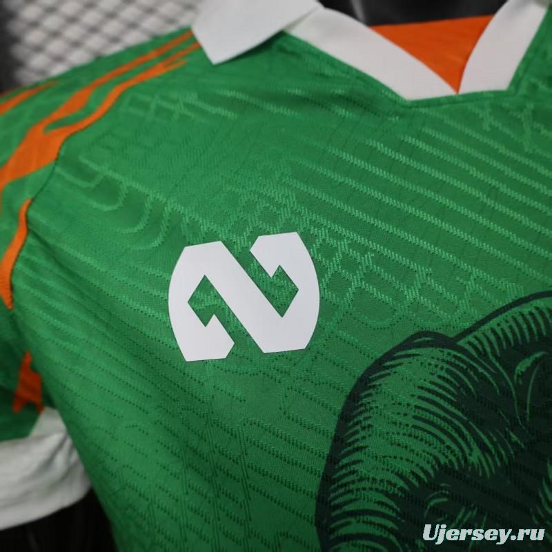 Player Version 2025 Ivory Coast Green with Elephant Graphic and Orange Trim Jersey